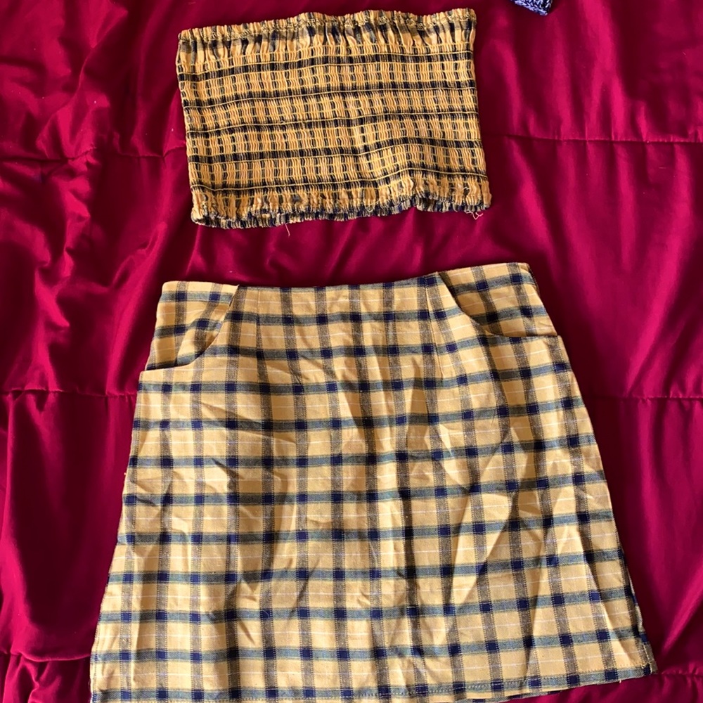 Two piece CLUELESS outfit. Tube top, mini skirt. Yellow and black.